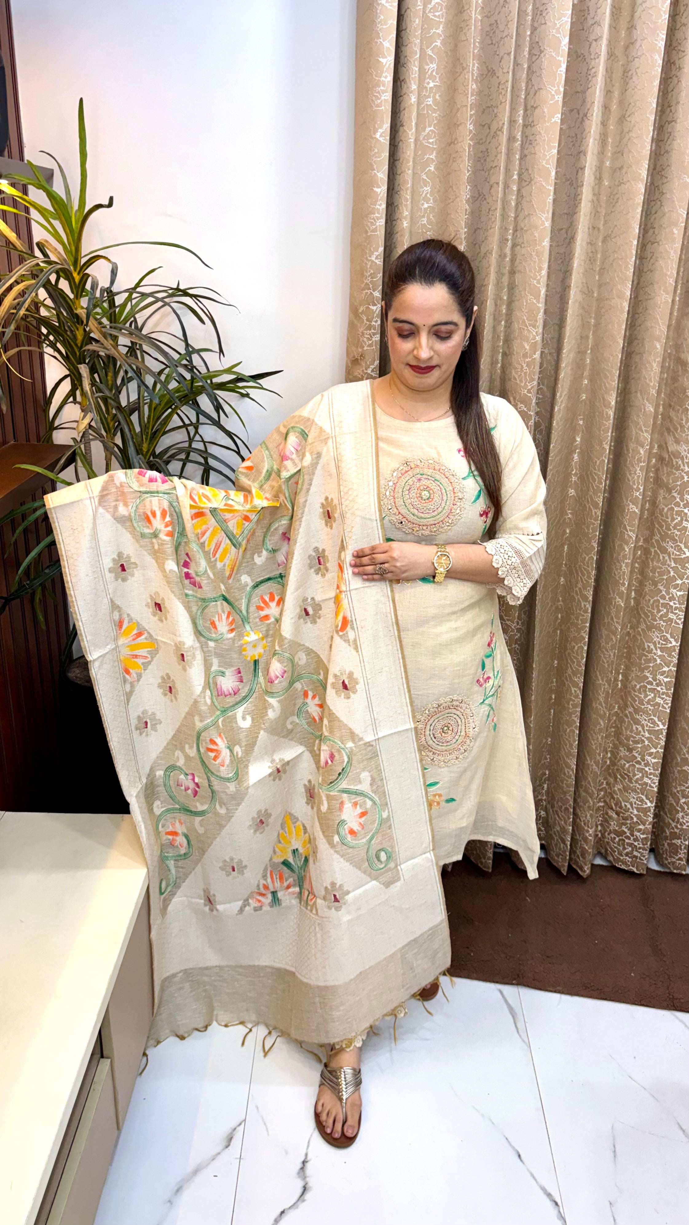 Mul Chanderi Applique Work Suit with Designer C-Cut Hemline & Brush Art Dupatta