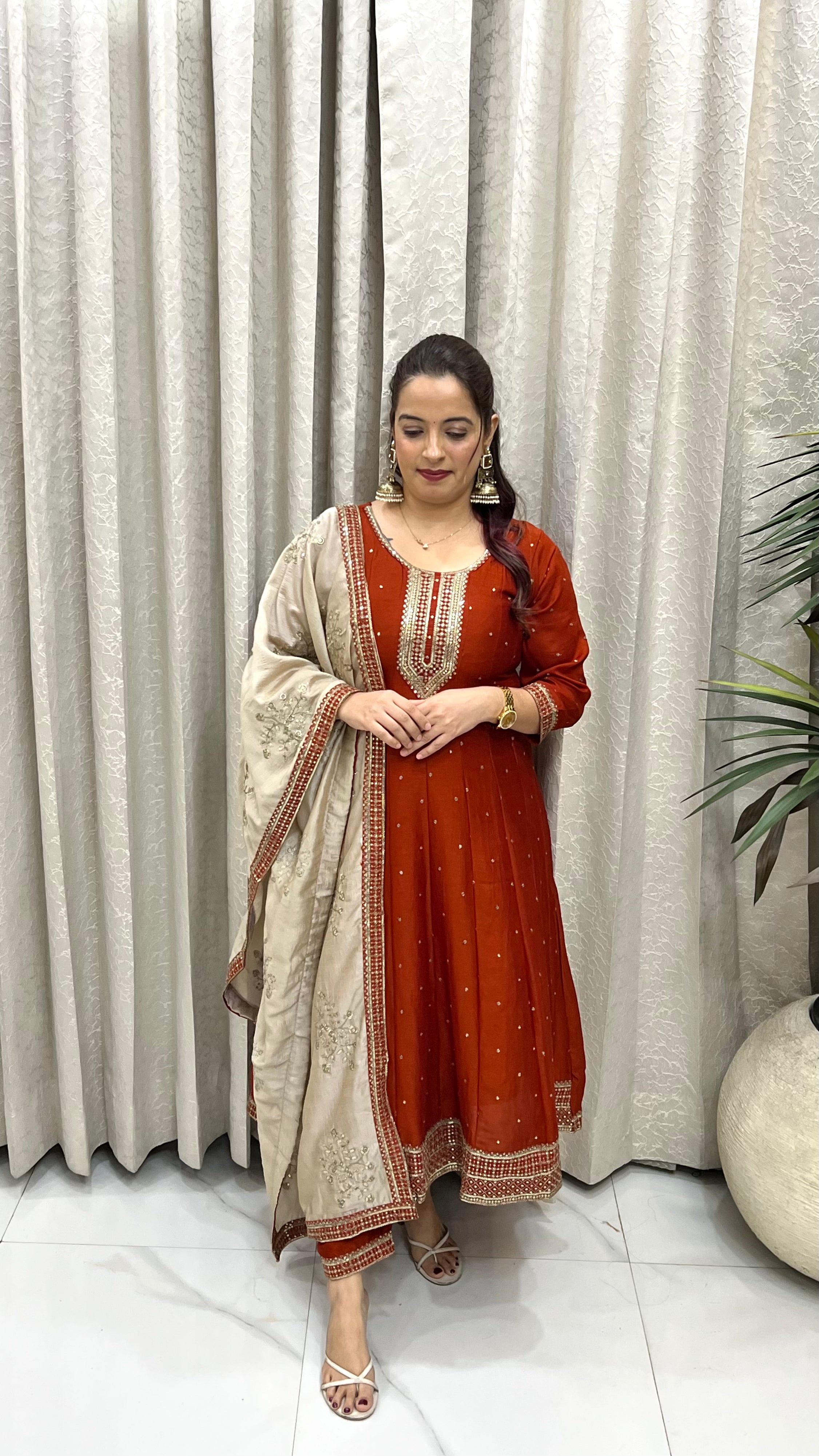 The Orange Pure Silk Anarkali Suit with Golden Paper Silk Dupatta