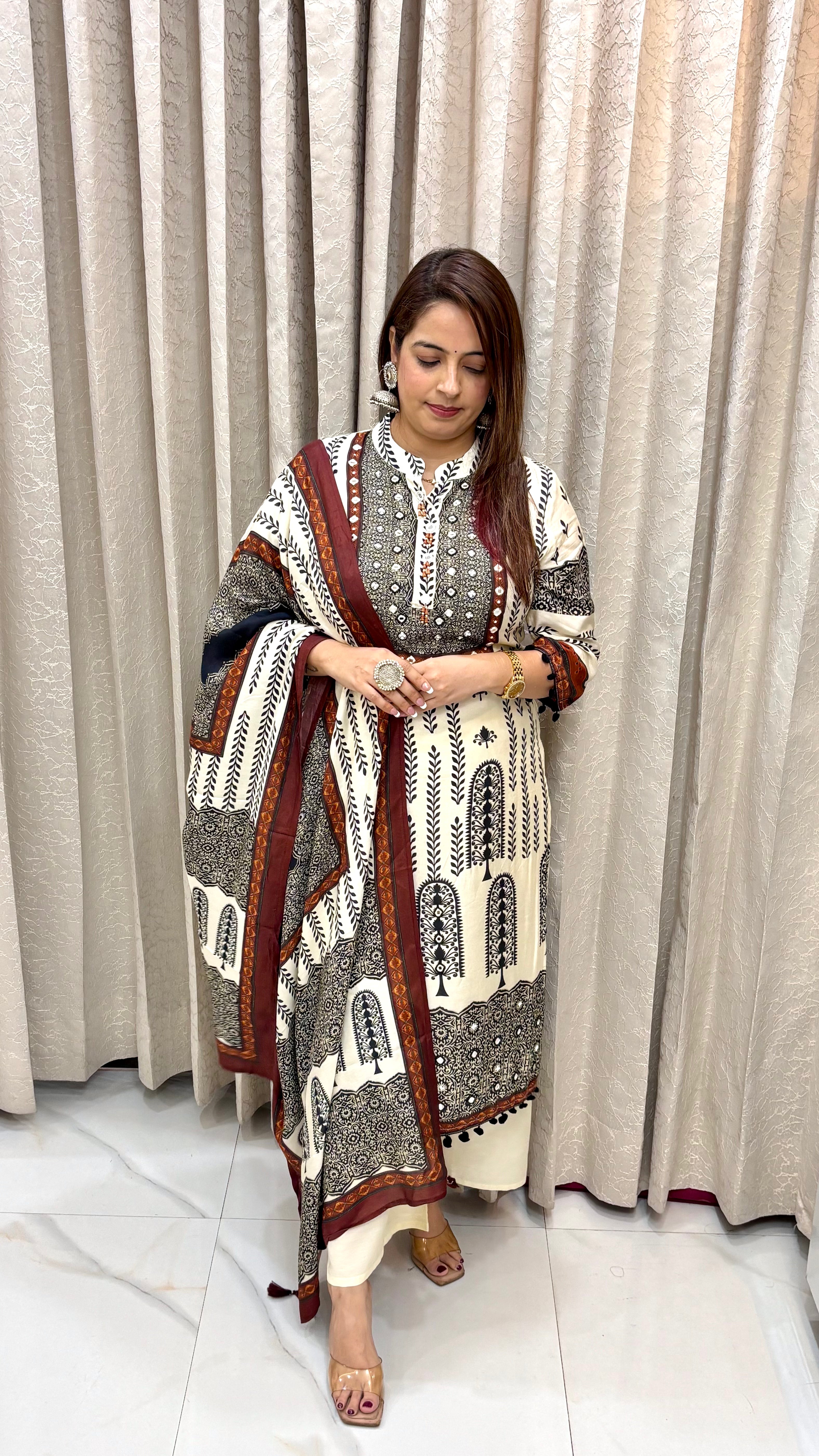 The Pure Crepe Ajrakh Print Suit with Hand Embroidery & Pom Pom Lace