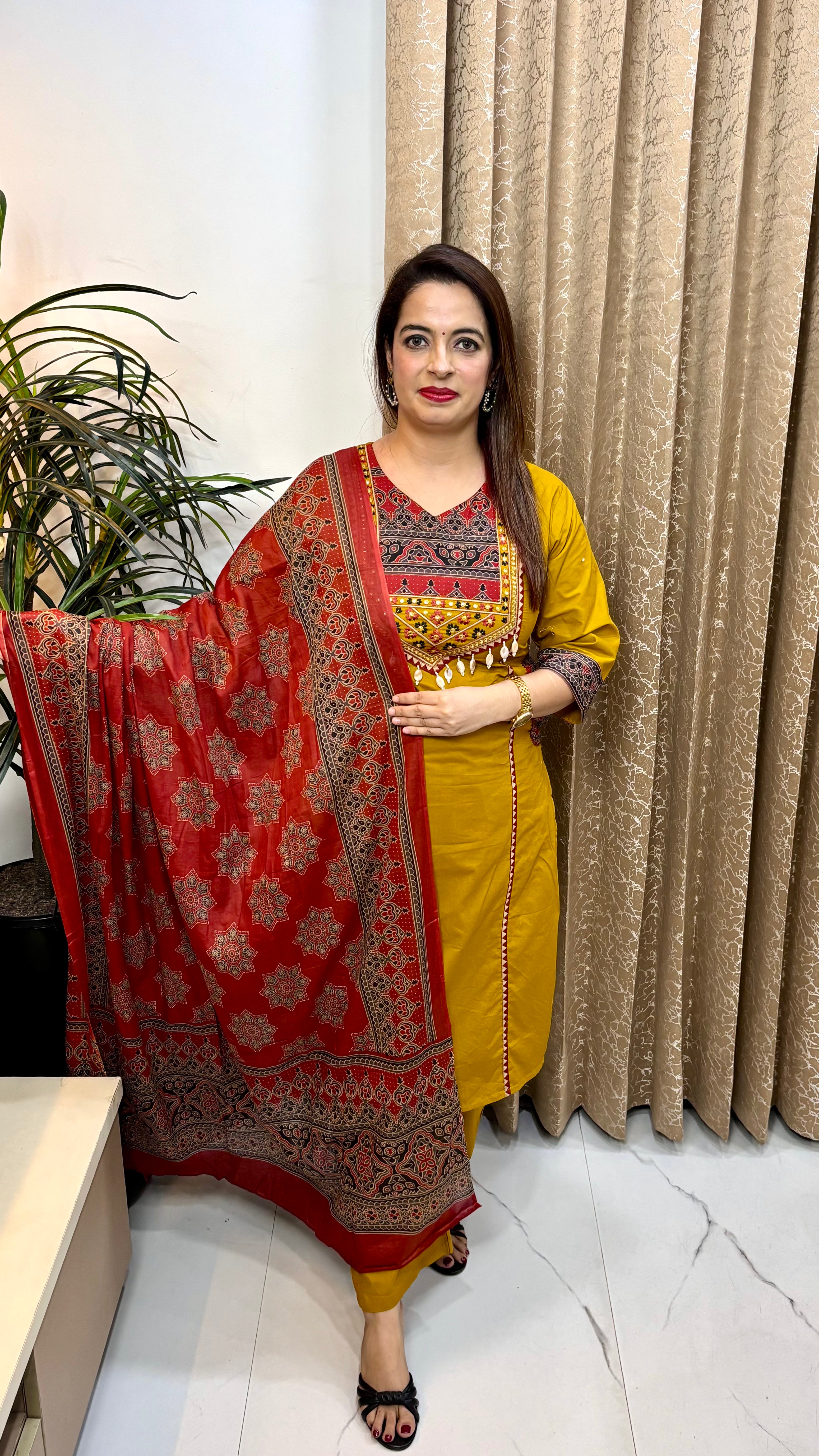 Pure Cotton Kalamkari & Dabu Print Suit with Neckline Hangings